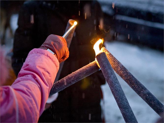 Torchlight tour in the northernmost town in Italy