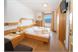 roomDouble room with wooden floor or carpet and balcony