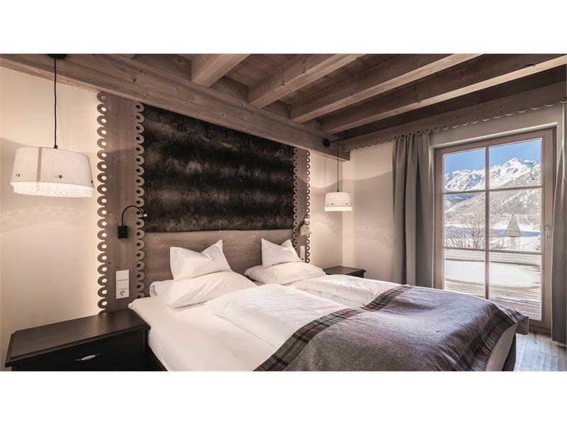 Schlafzimmer Chalets Edelweiss Südtirol