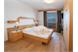 Double room with wooden floor or carpet and balcony