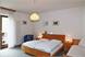 Camera da letto con balcone (appartamento 4-6 persone)