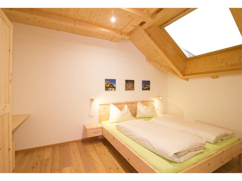 Schlafzimmer in Zirbenholz (