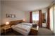 Apartment Gonnawand - Schlafzimmer mit Ostbalkon und Morgensonne