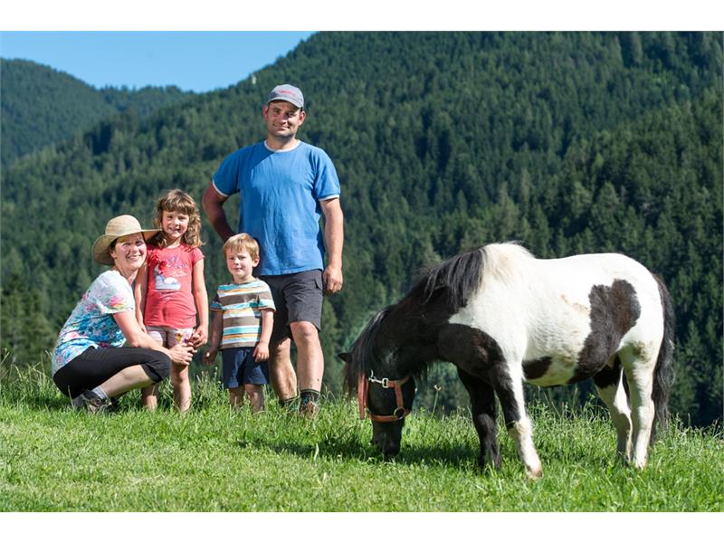 your farmers family: Valentin, Angelika, Johanna and Silas