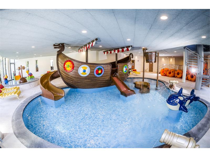 Kids indoor pool with wiking boat