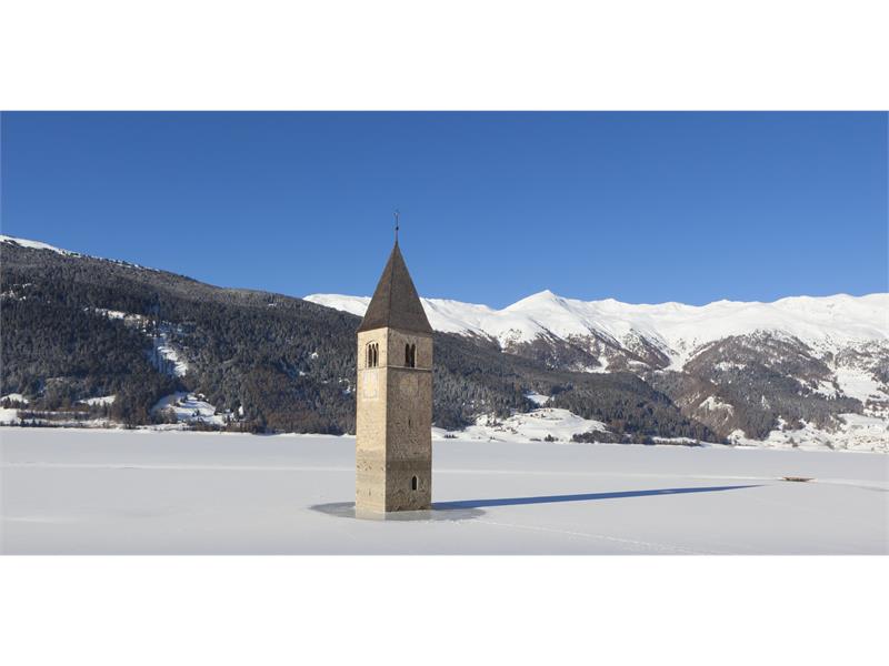 Tower in the lake Reschensee in winter