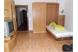 Wohnzimmer mit Schlafgelegenheit im Appartement Alpenrose