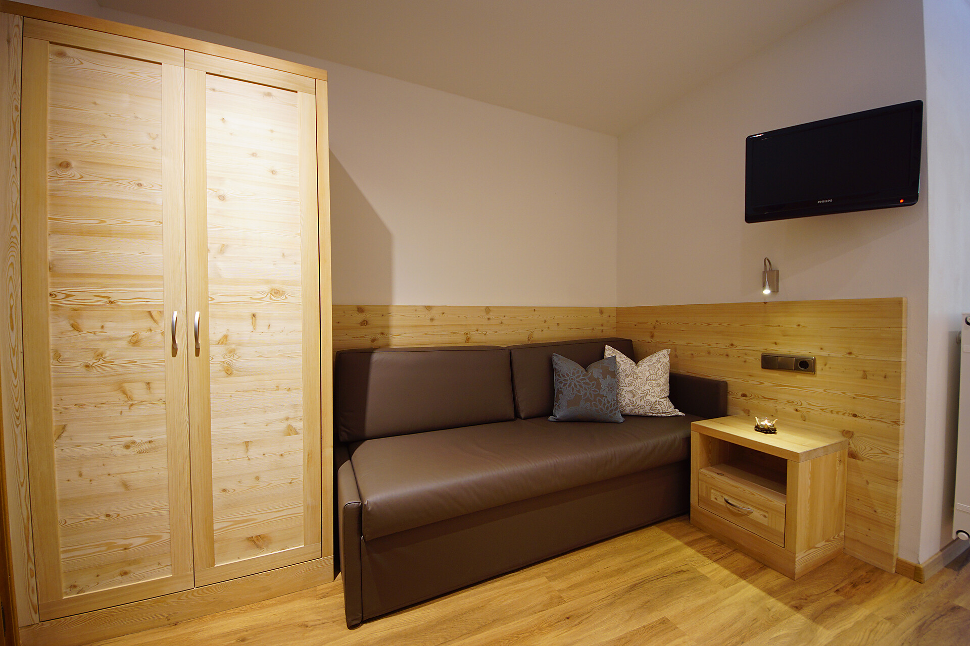 Einzelzimmer mit Sofa